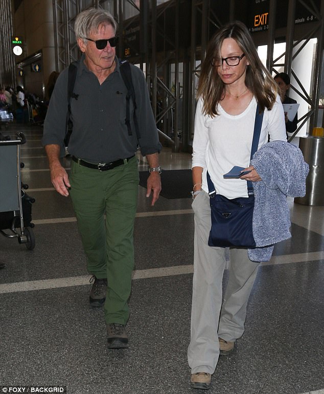 Keeping it simple: Calista, who is best known for starring in Ally McBeal from 1997 to 2002, carried a warm jacket over one arm
