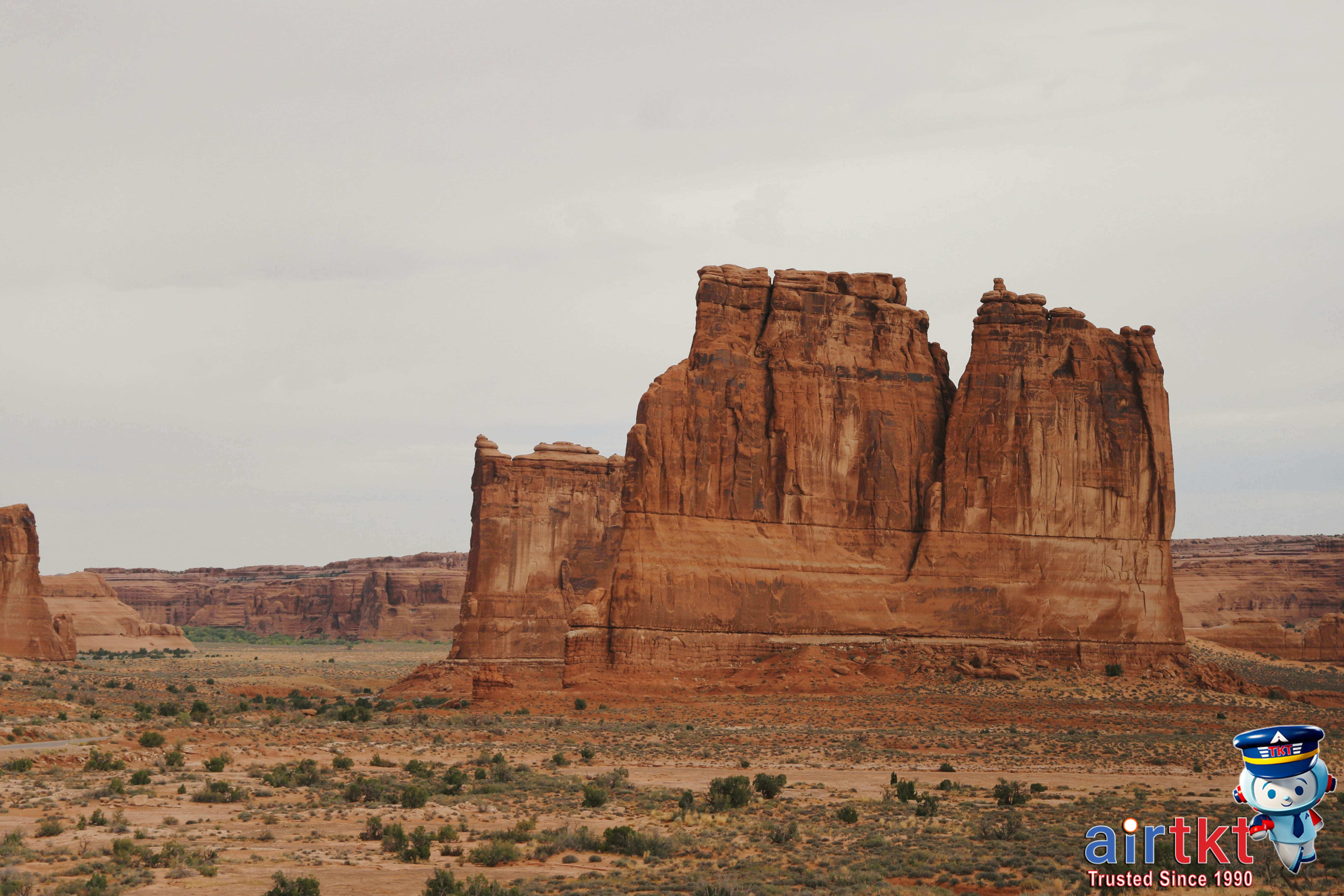 Red sandstone cliffs and desert landscape in Moab, Utah
