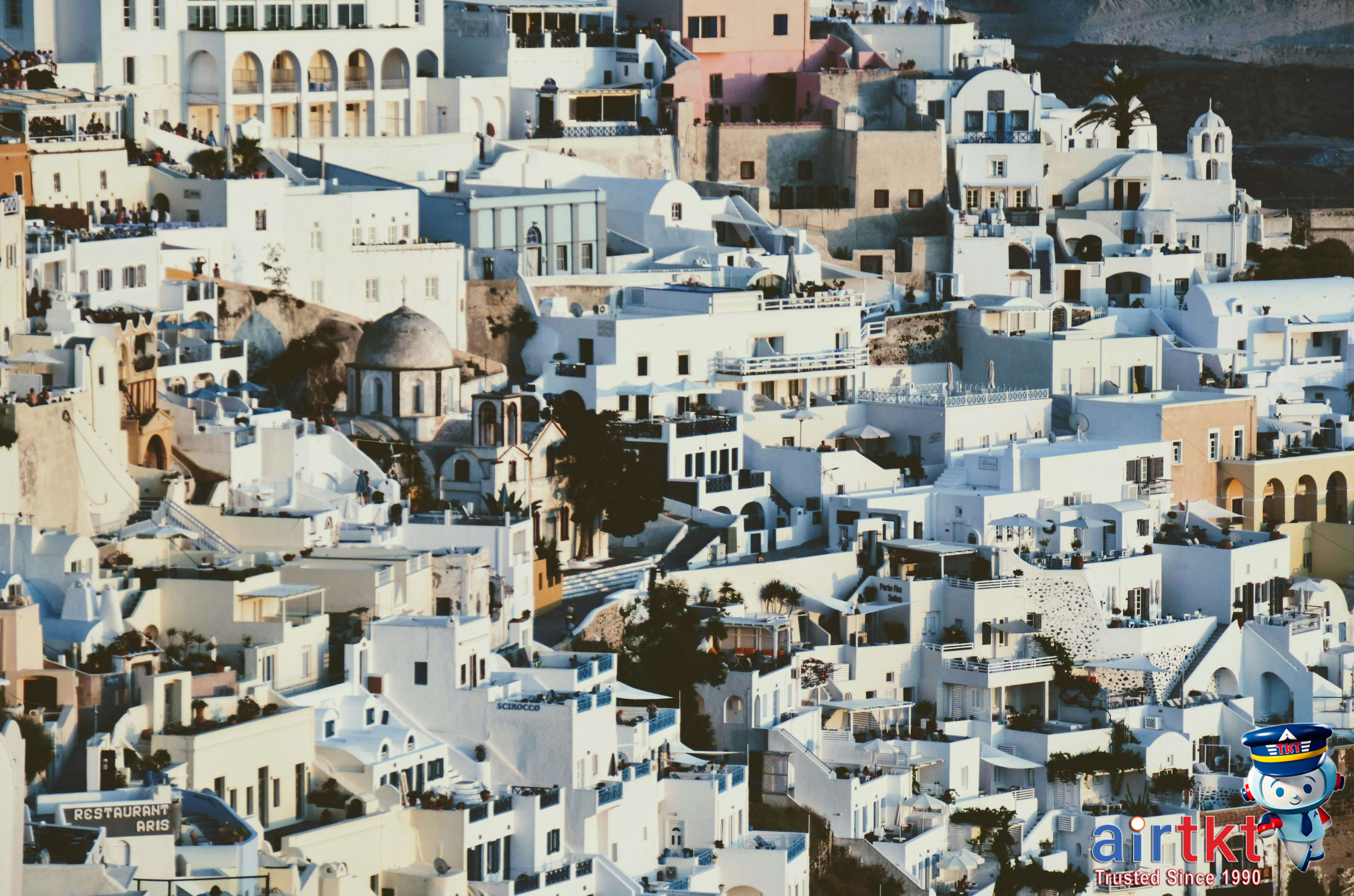 Santorini romantic sunset with white buildings