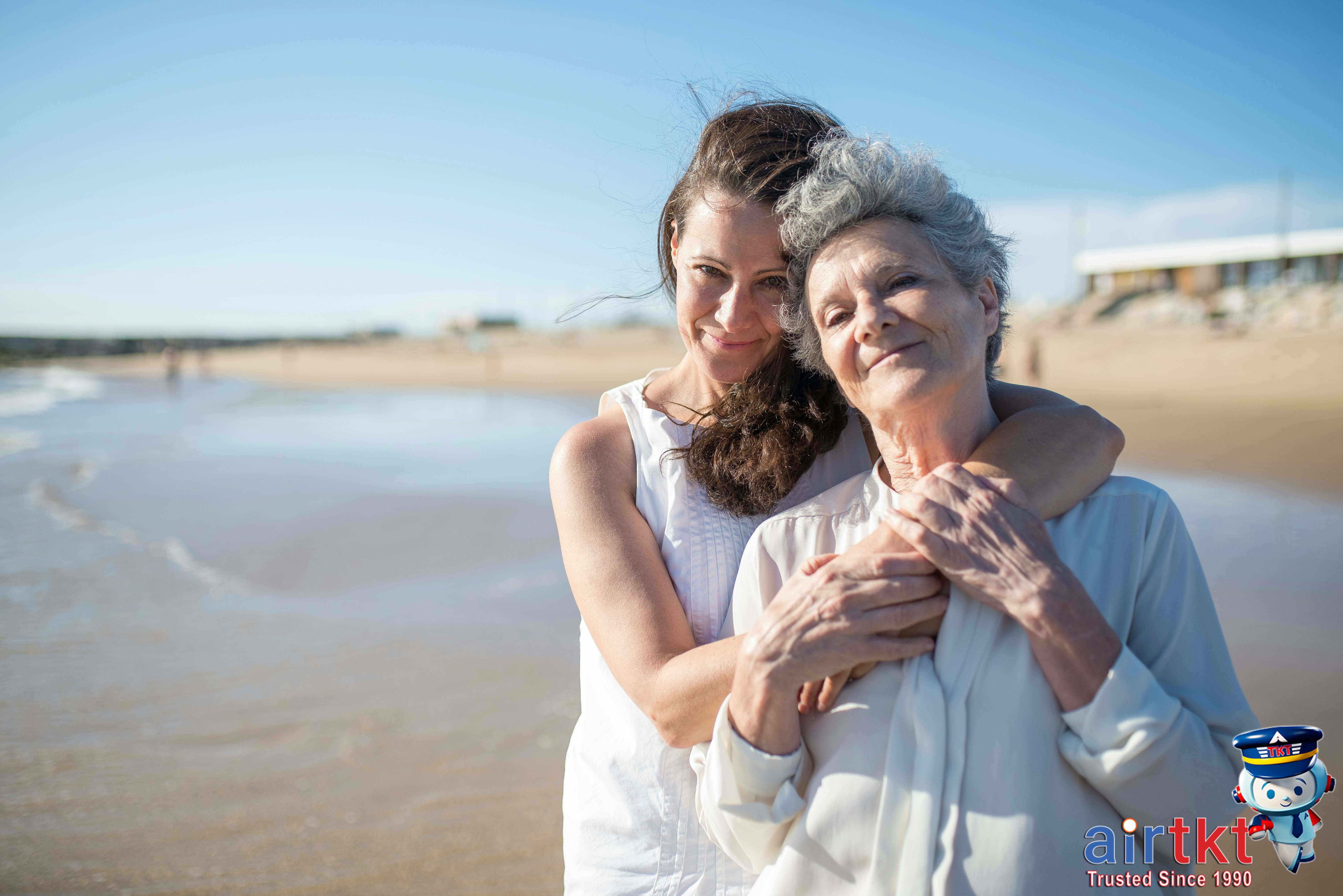 Couple enjoying a beach at sunset