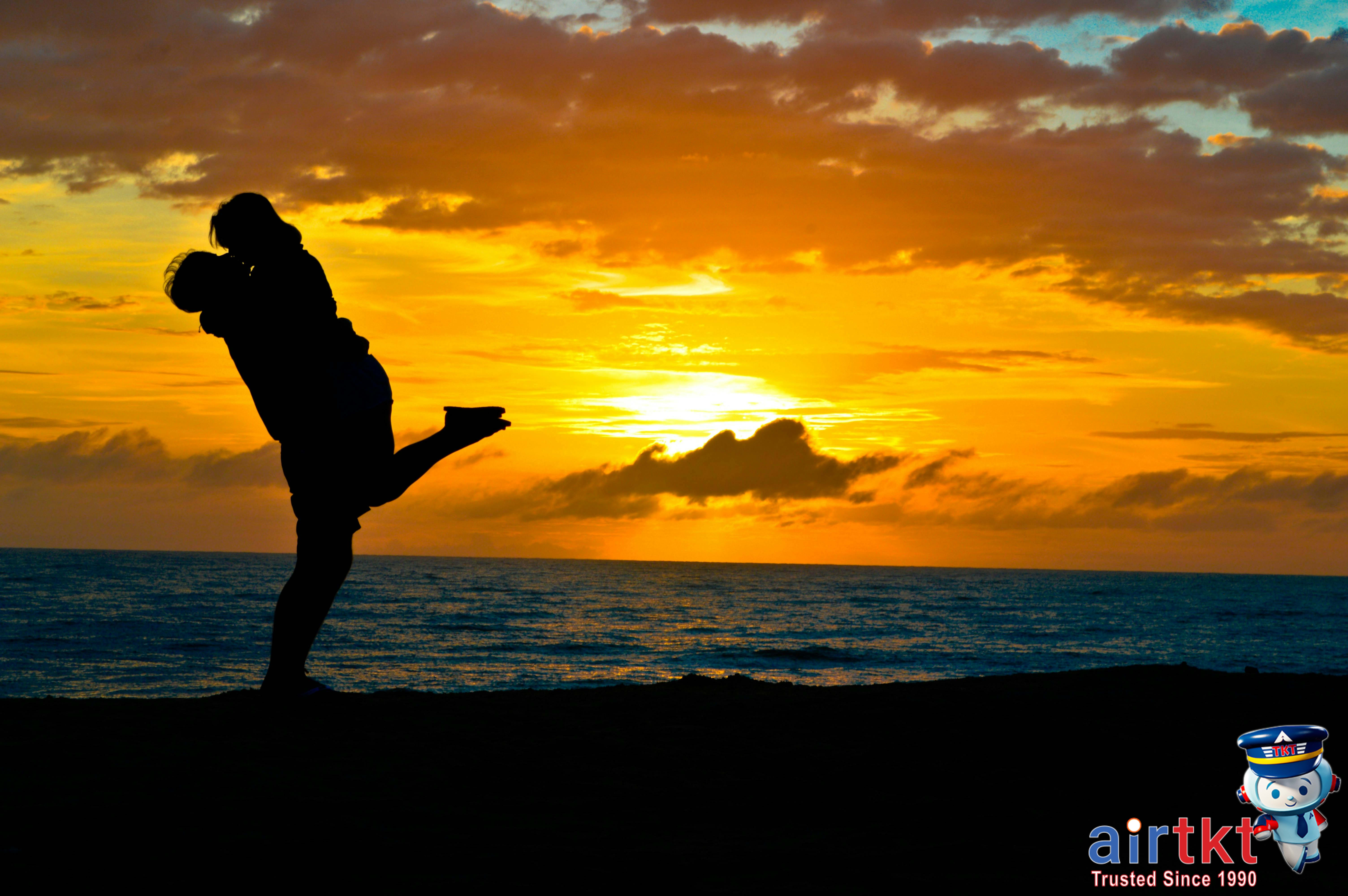 Couple enjoying romantic honeymoon at a beautiful beach
