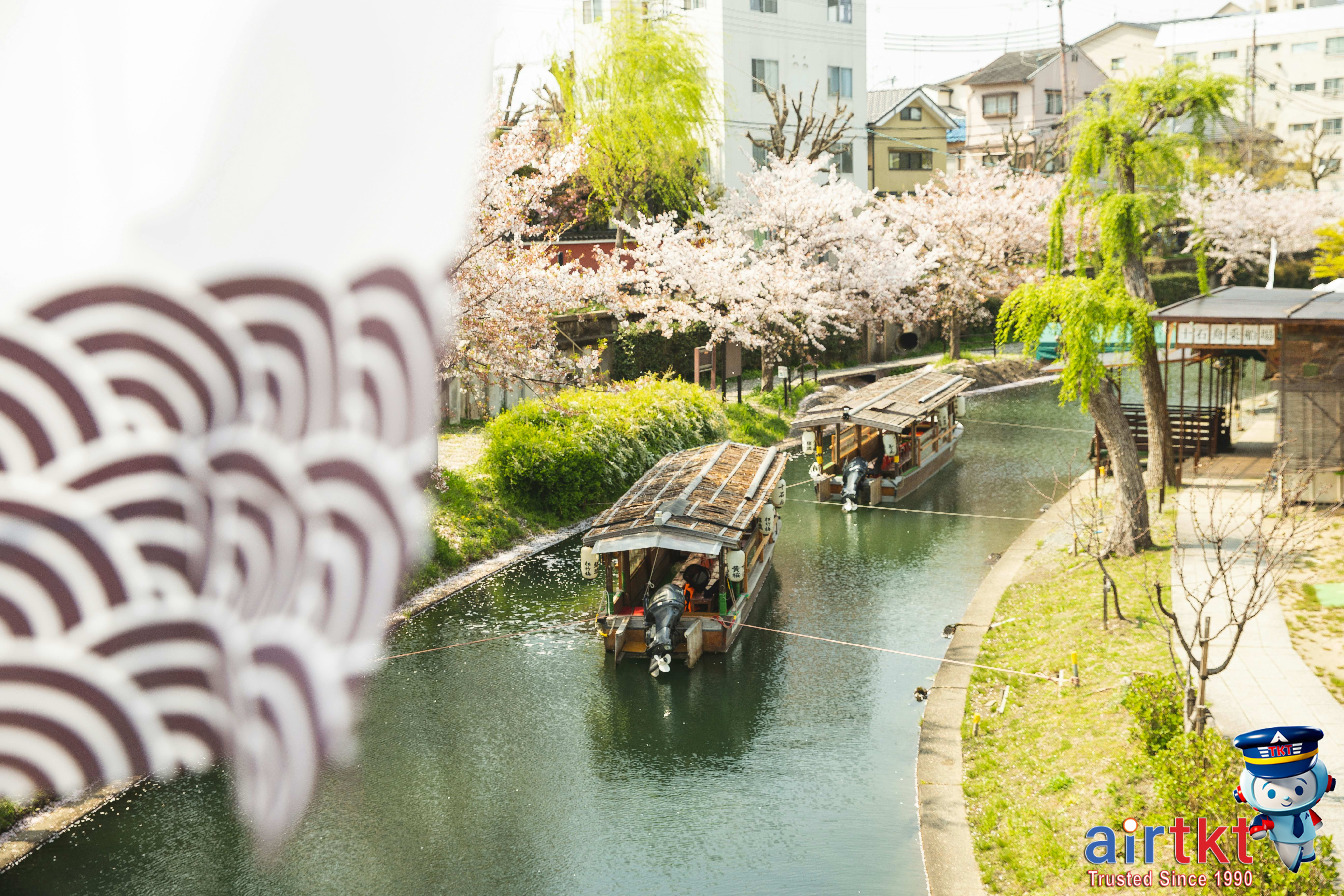 Maldives public ferry with island in background