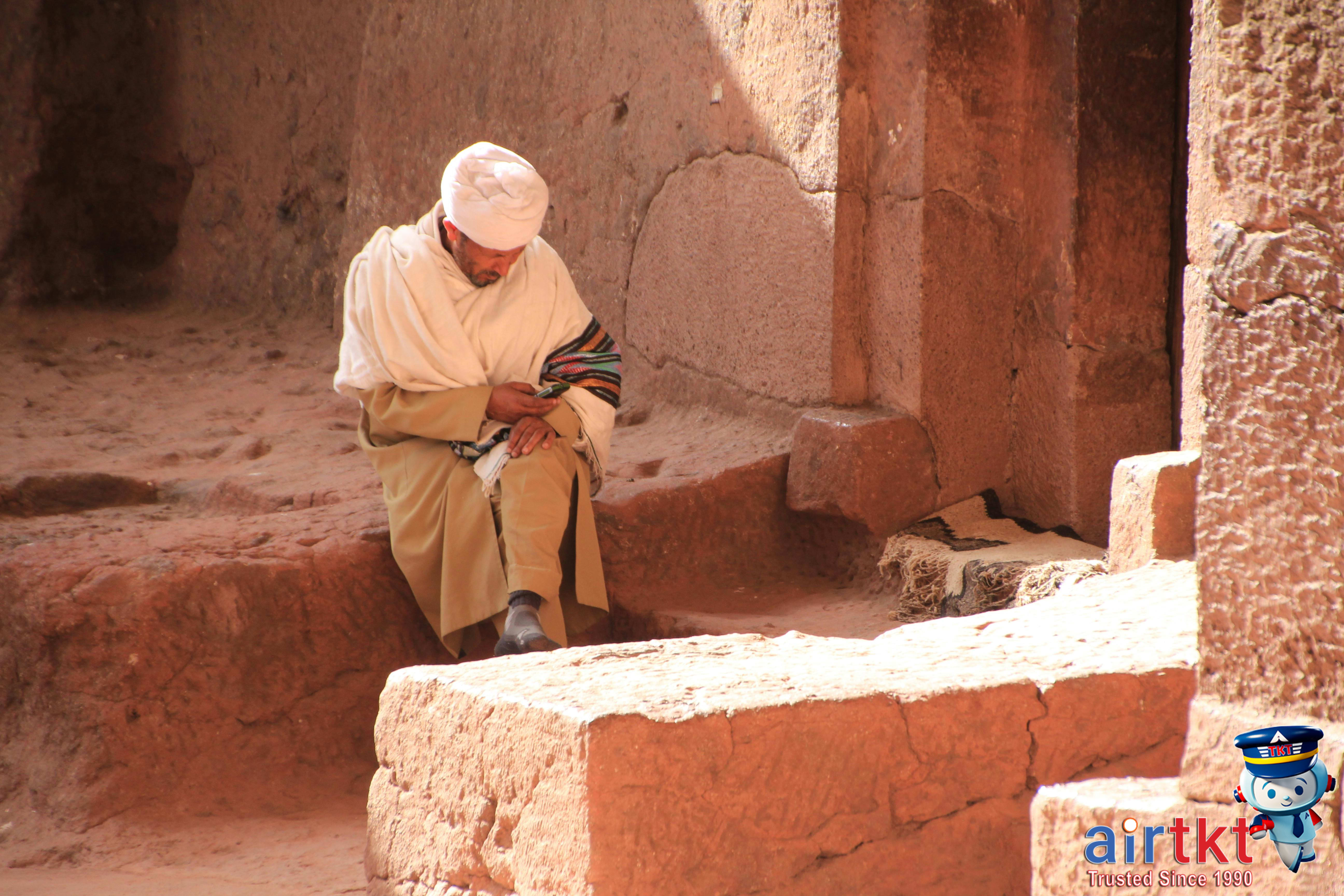 Visitors respecting dress code at a sacred site