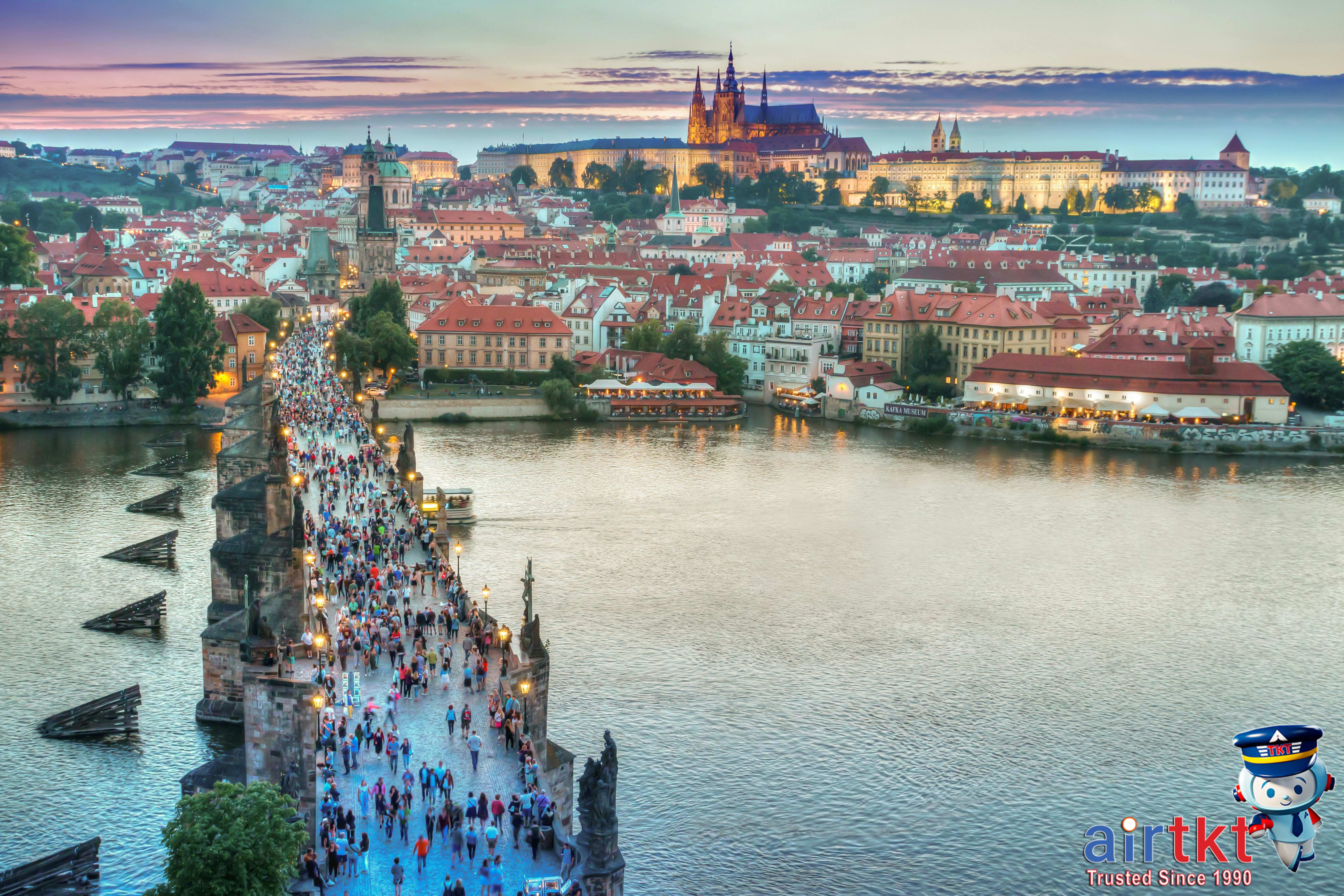 City skyline with famous bridge landmark at sunset