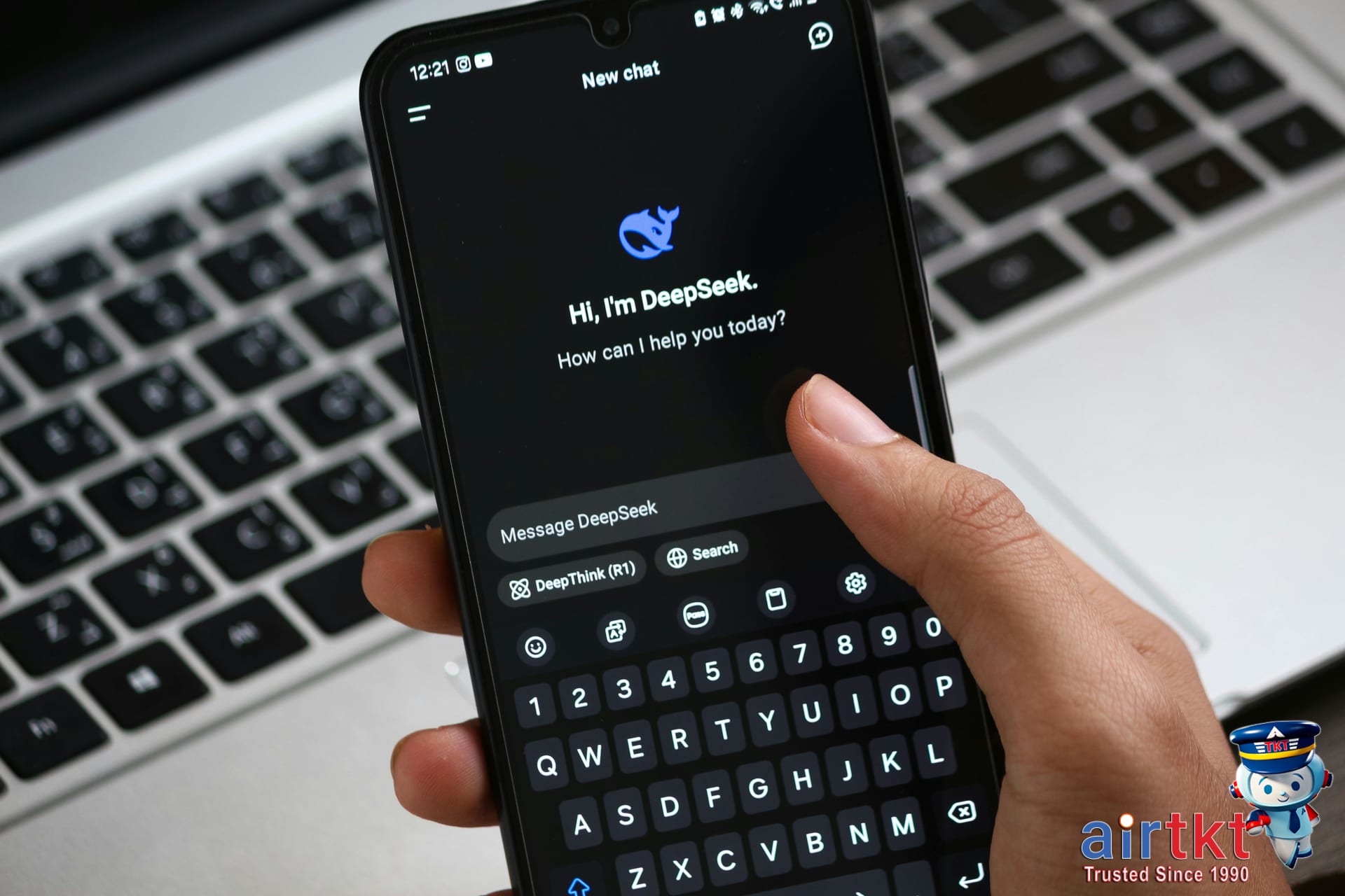 Traveler using AI chatbot on smartphone at airport