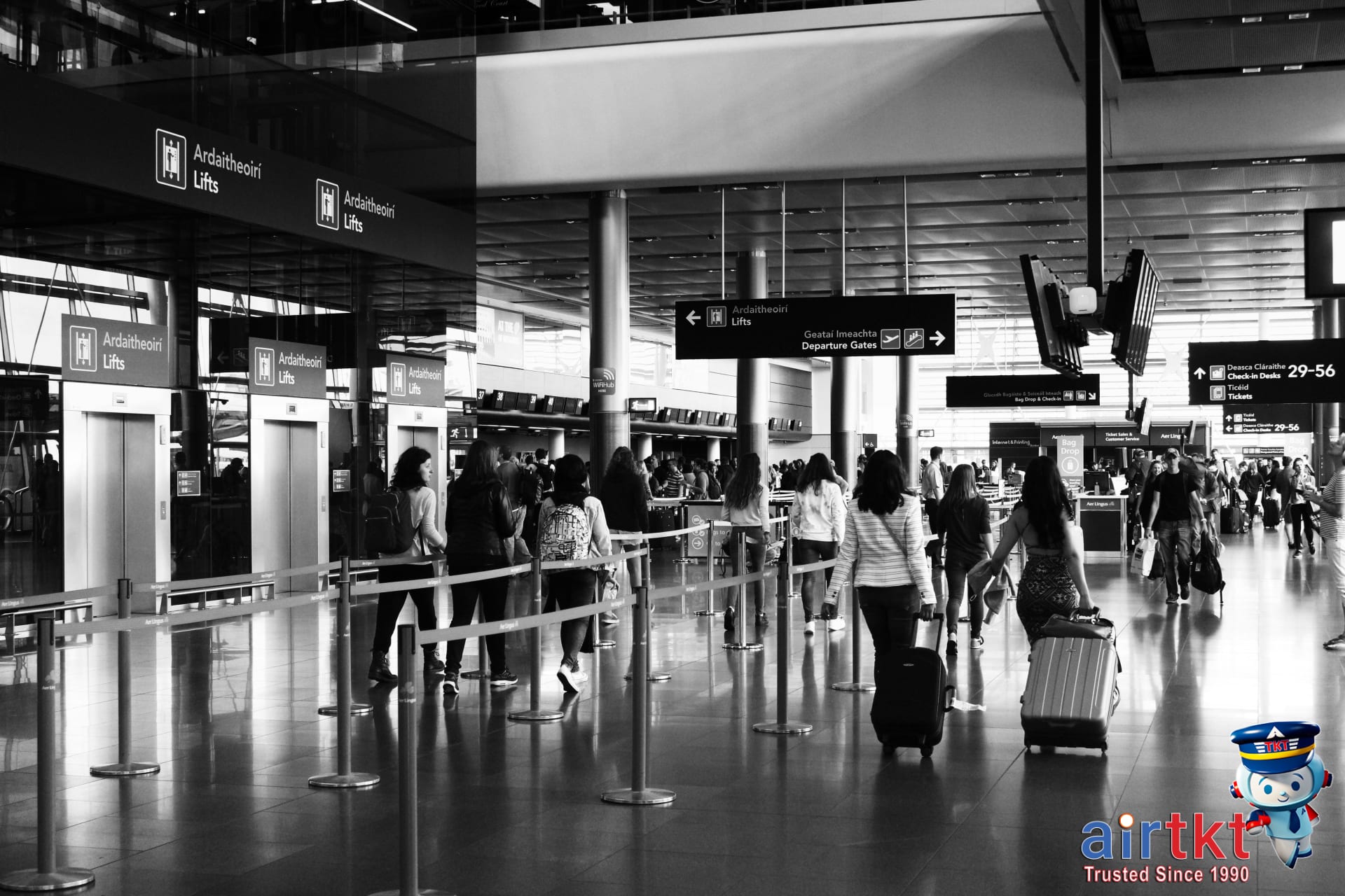 Busy airport terminal with travelers during New Year