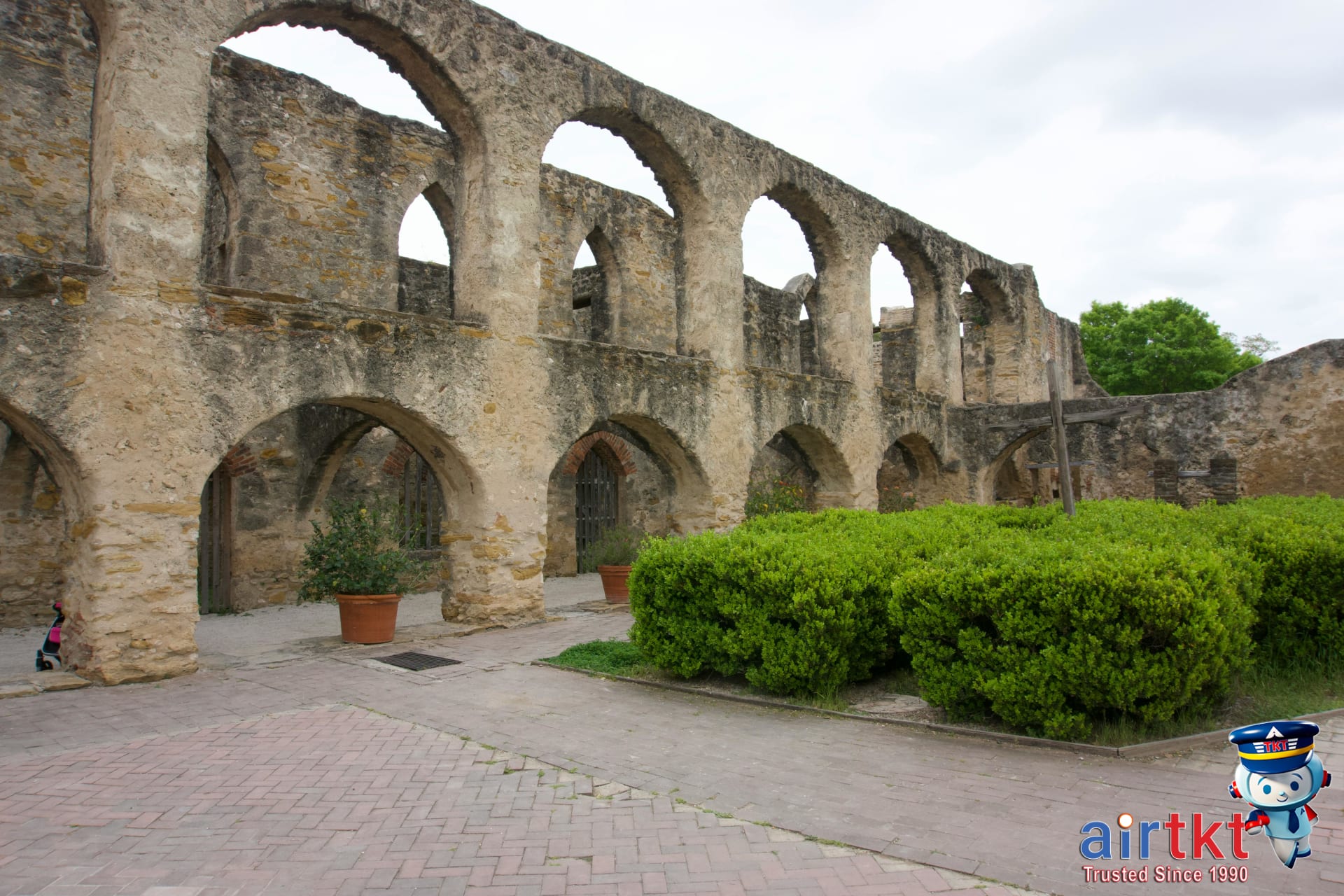 Historic arched stone facade at San Antonio Missions
