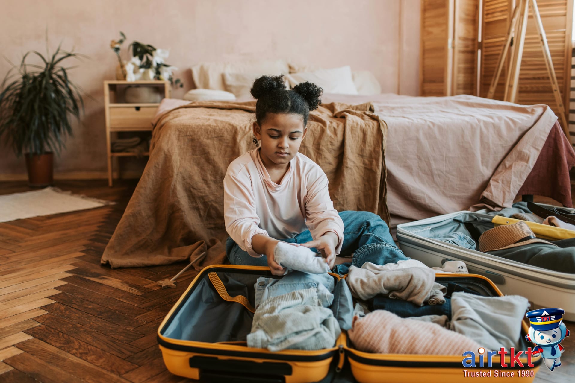Packed kids' travel essentials in colorful organizers
