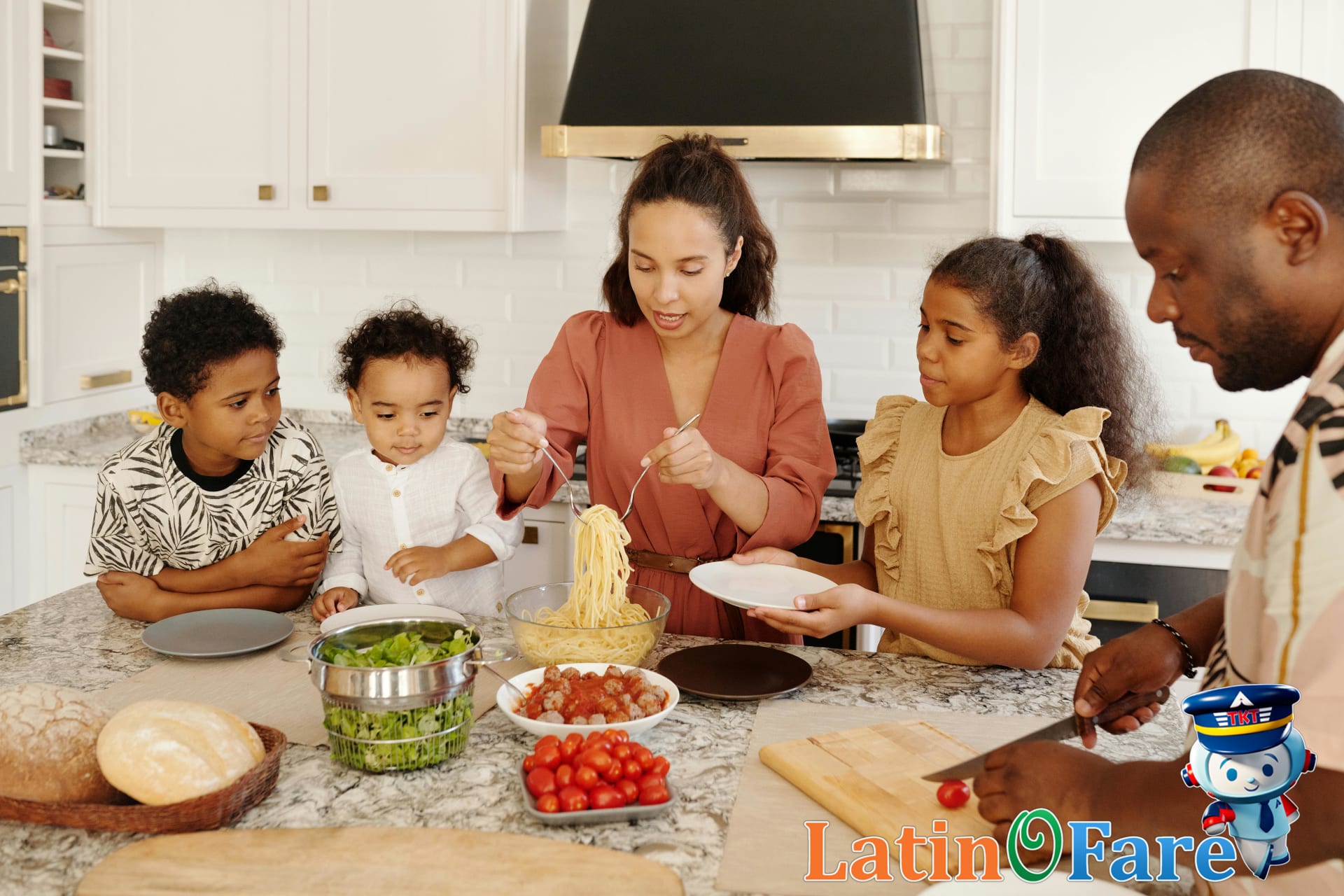 Family cooking together in a modern kitchen with fresh vegetables