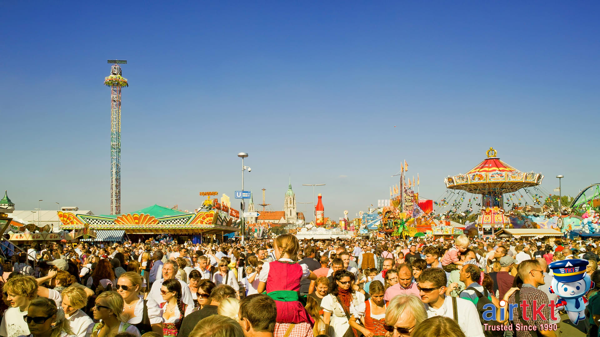 Family enjoying theme park rides on a sunny day