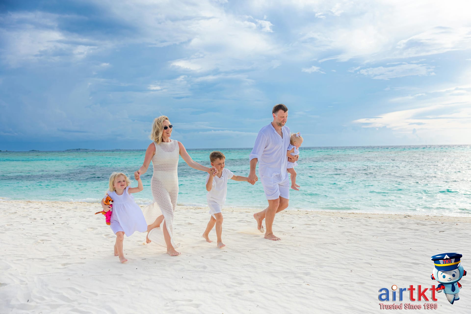 Family enjoying time at vacation rental with kitchenette