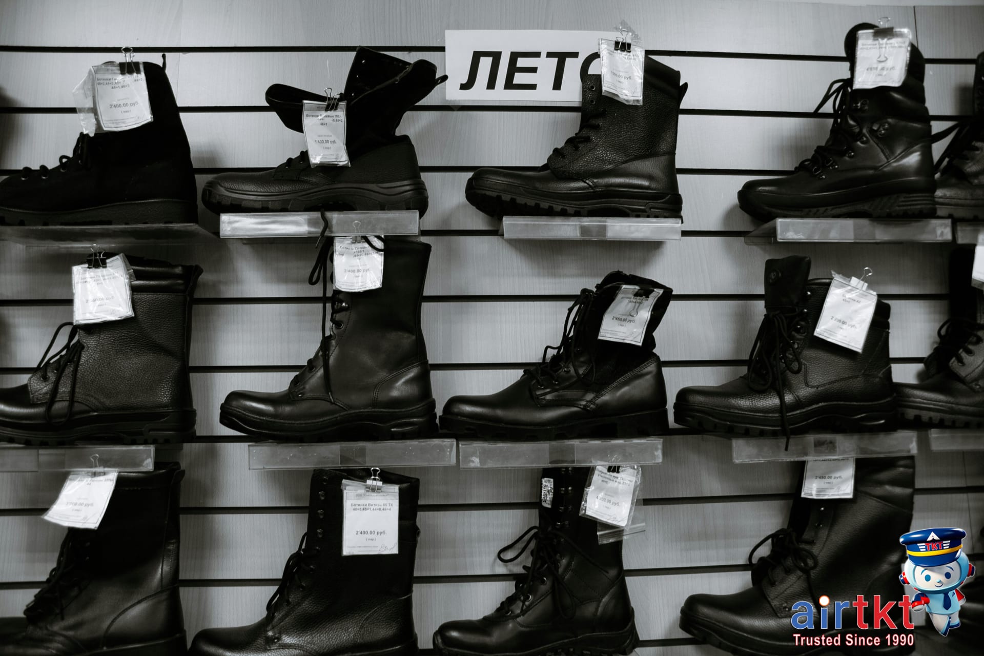 Hiking boots neatly packed in a suitcase, protected for travel