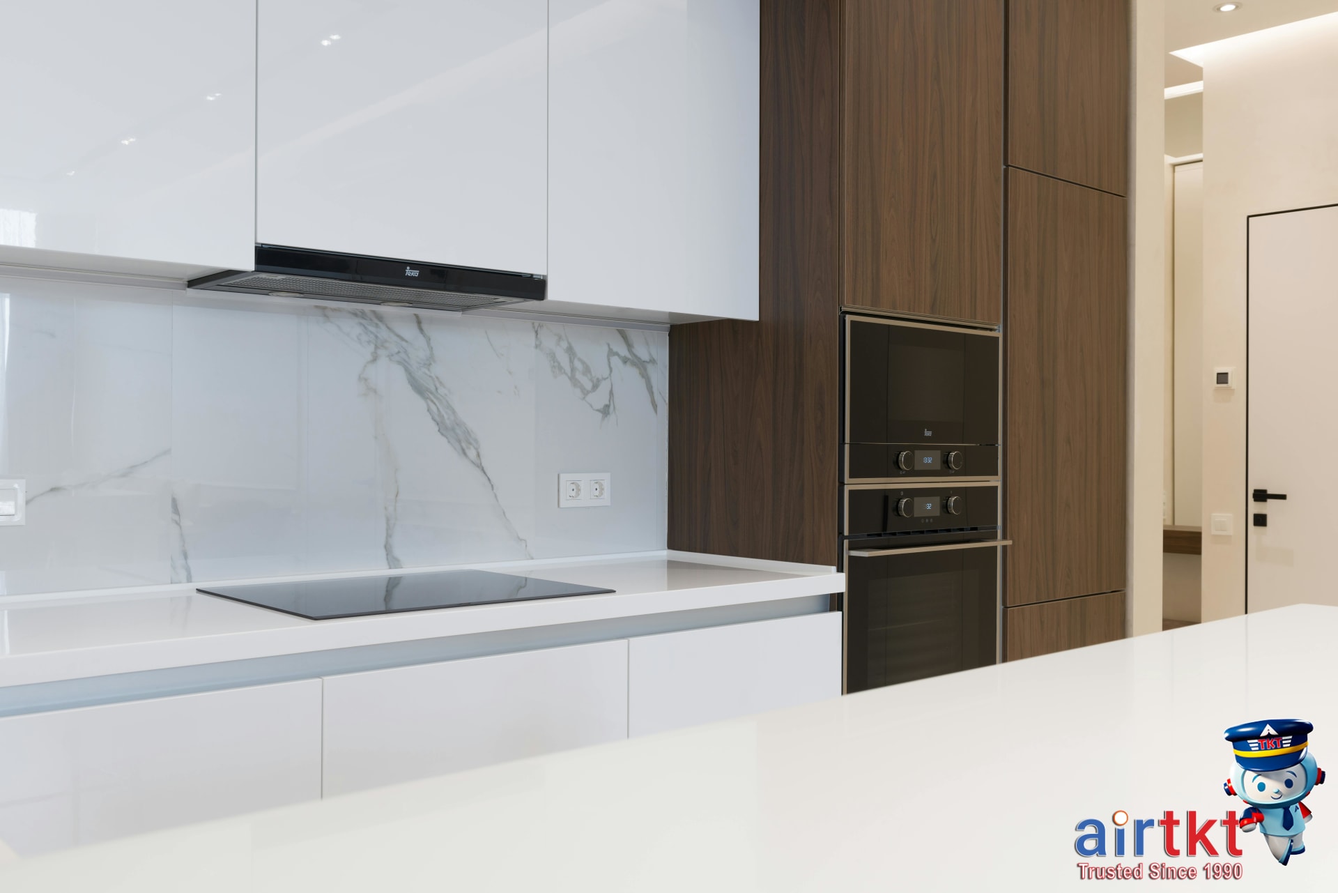 Family cooking together in kitchen accommodation