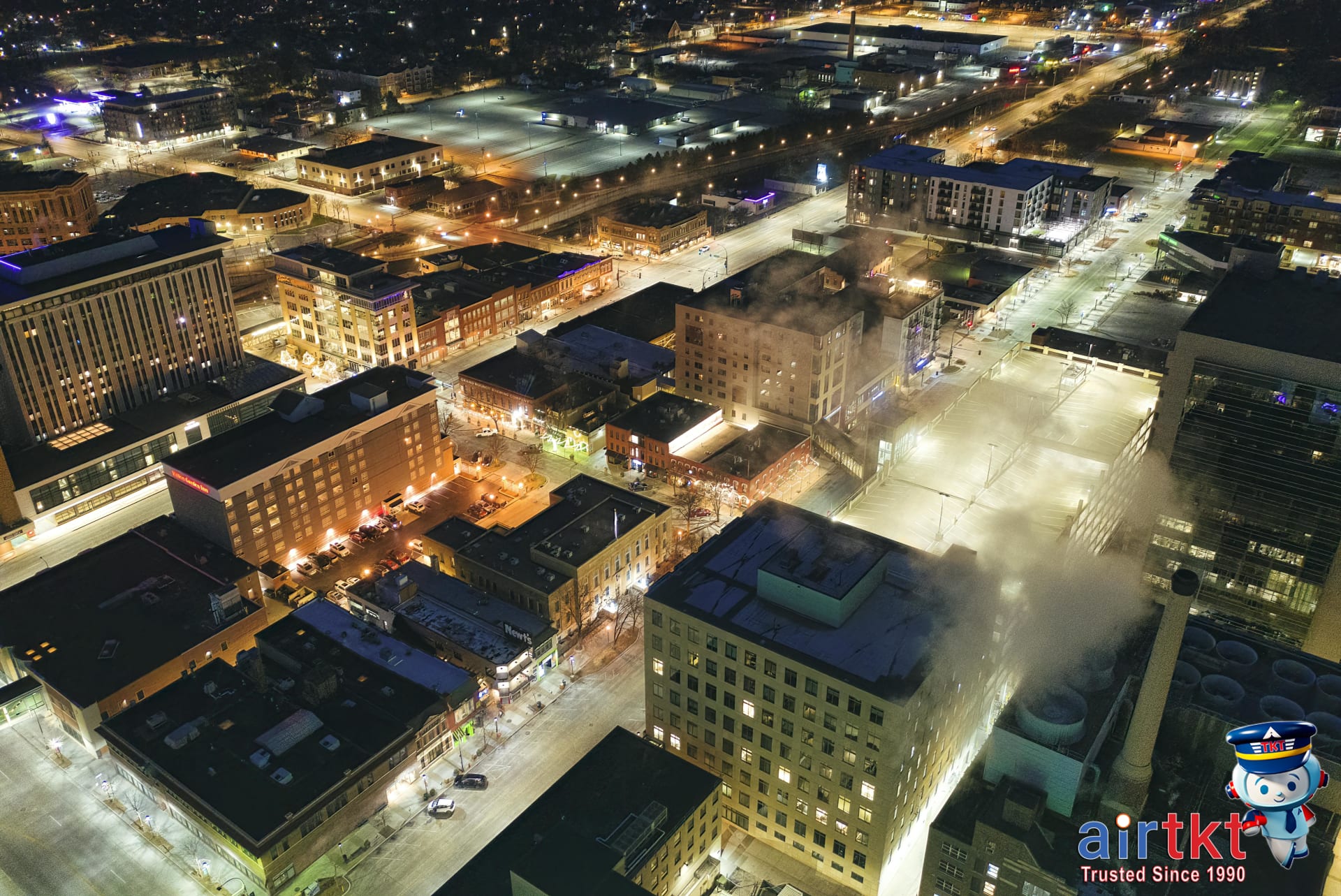 Aerial view of Rochester Public Market with lively urban night scene