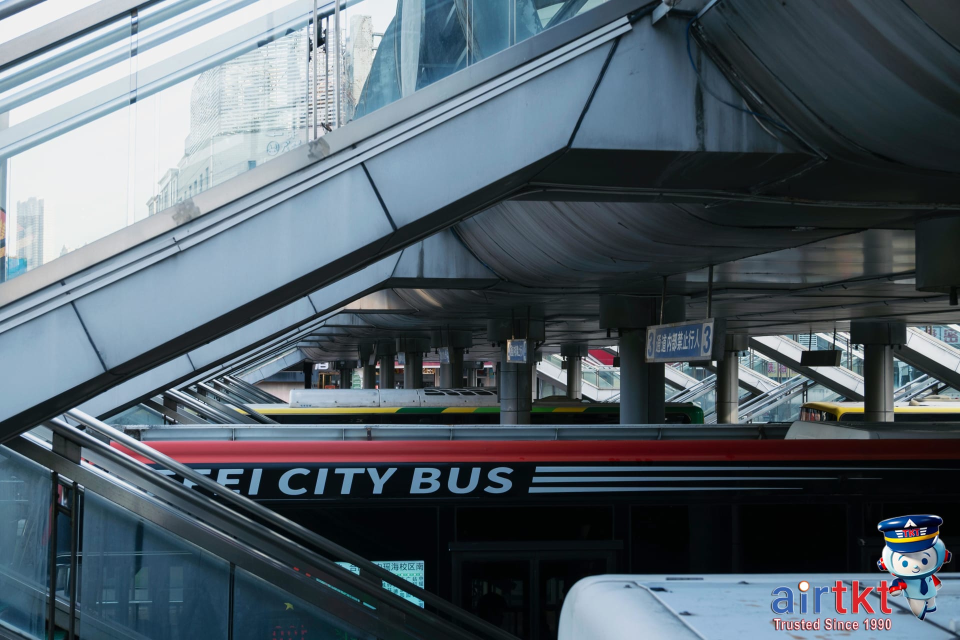 Syracuse city bus station with colorful modern buses