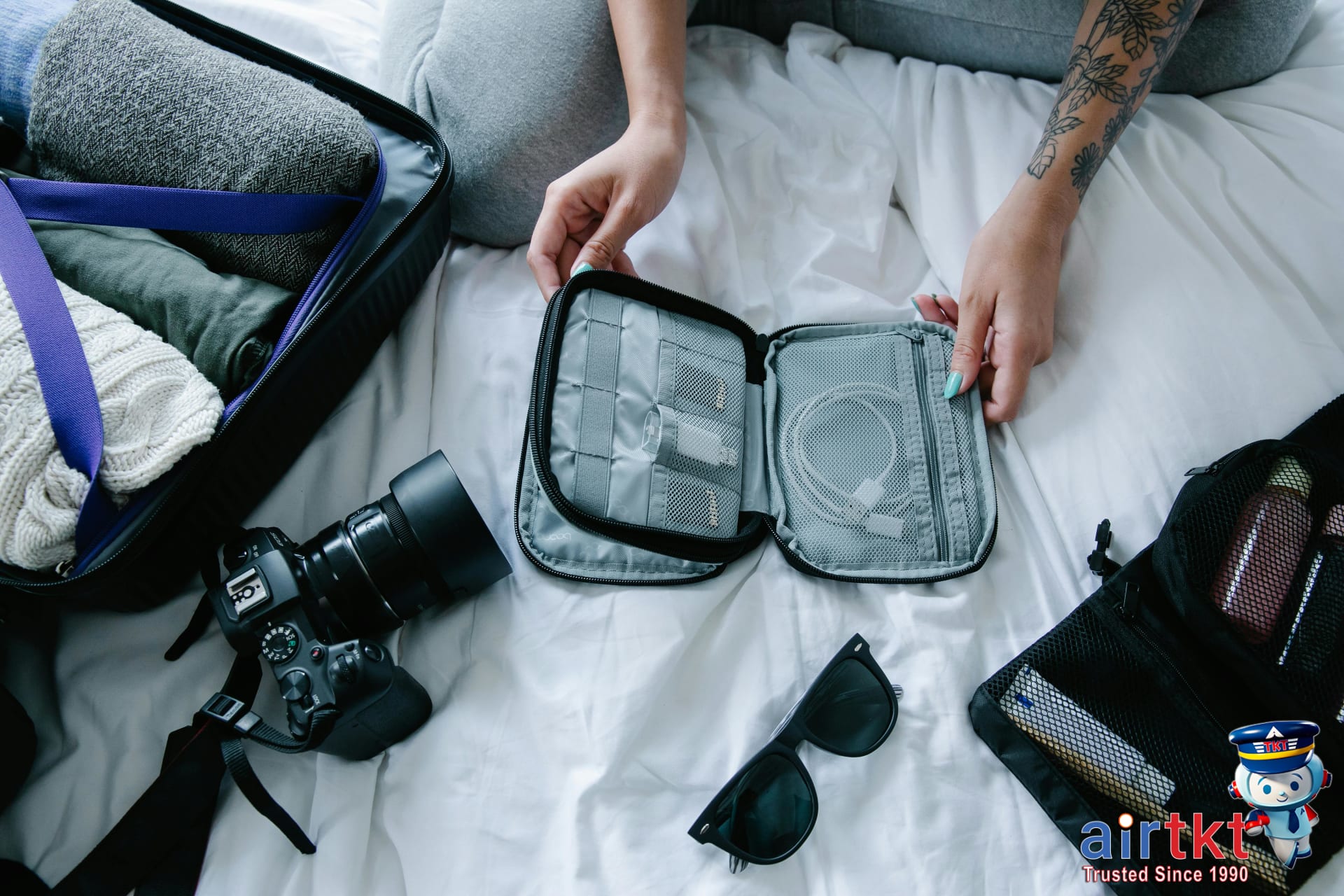 Packing cubes organizing clothes inside luggage