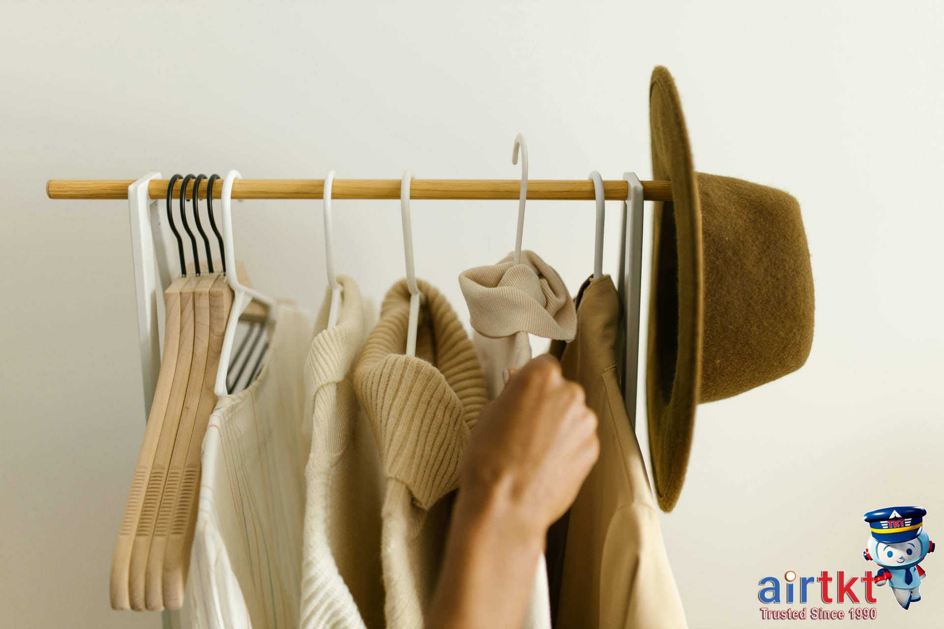 Minimalist travel packing with essentials organized in compact luggage