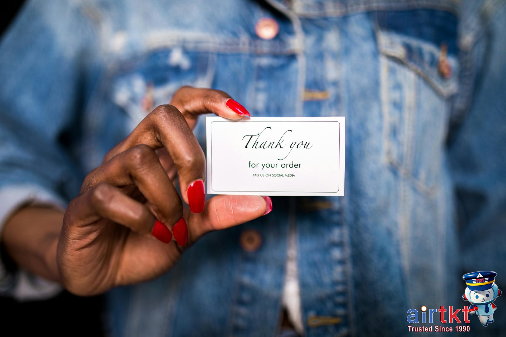 Airplane flying above clouds, symbolizing travel rewards