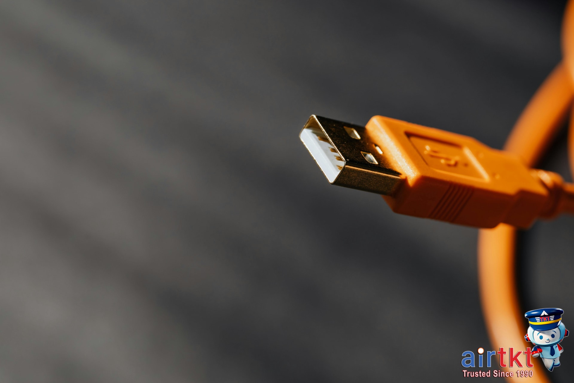 Various essential electronics cables packed for travel