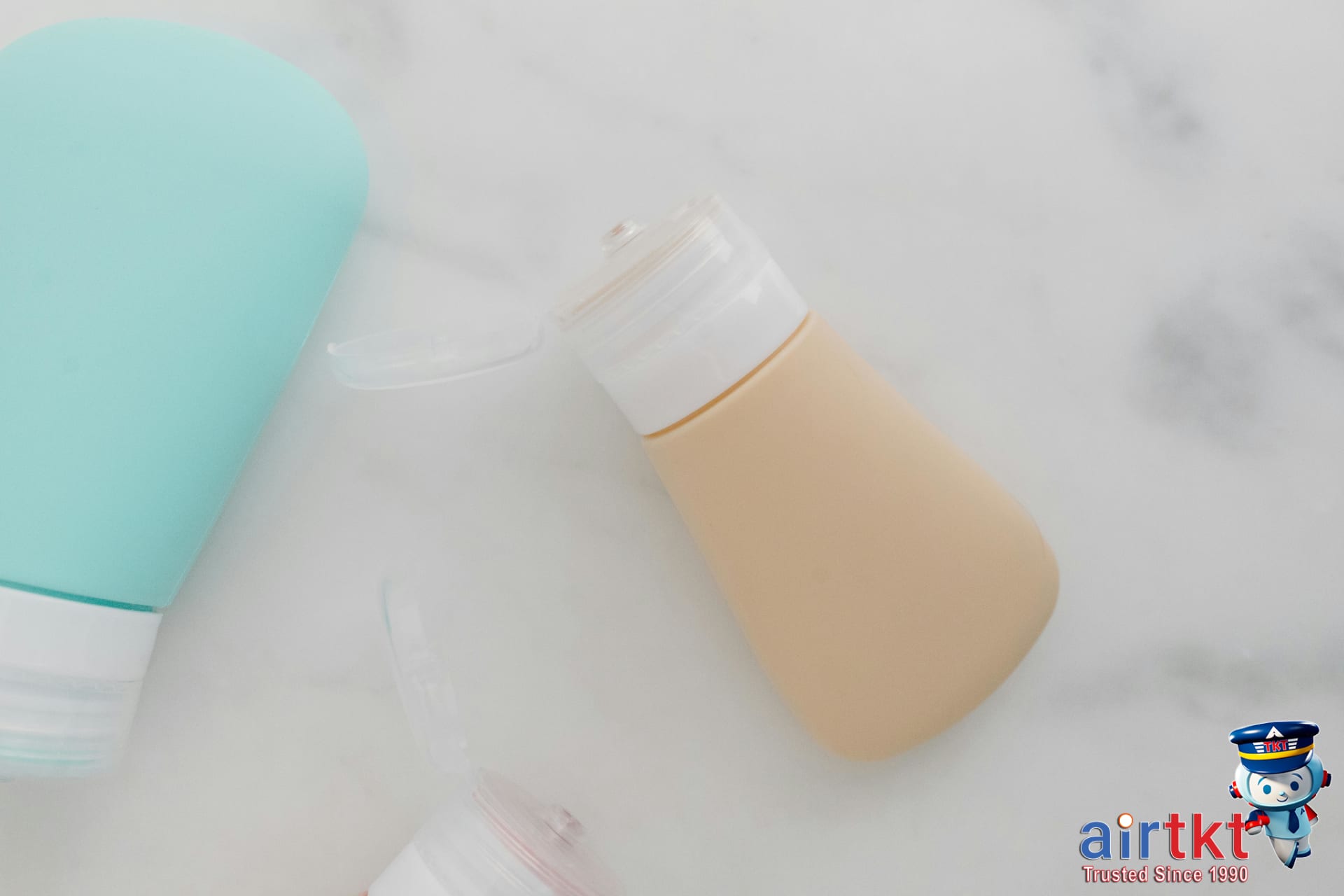 Packing travel laundry essentials including detergent and clothes