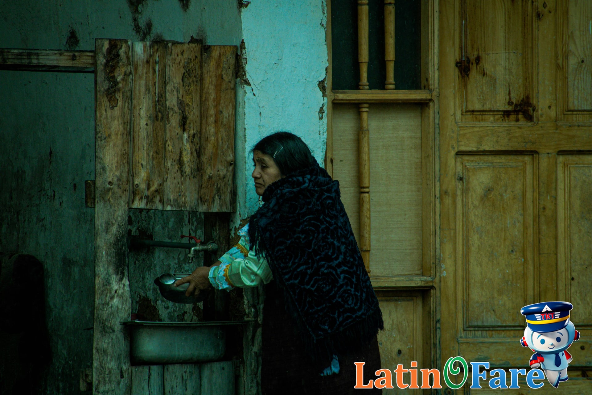 Packed suitcase with travel essentials and laundry accessories