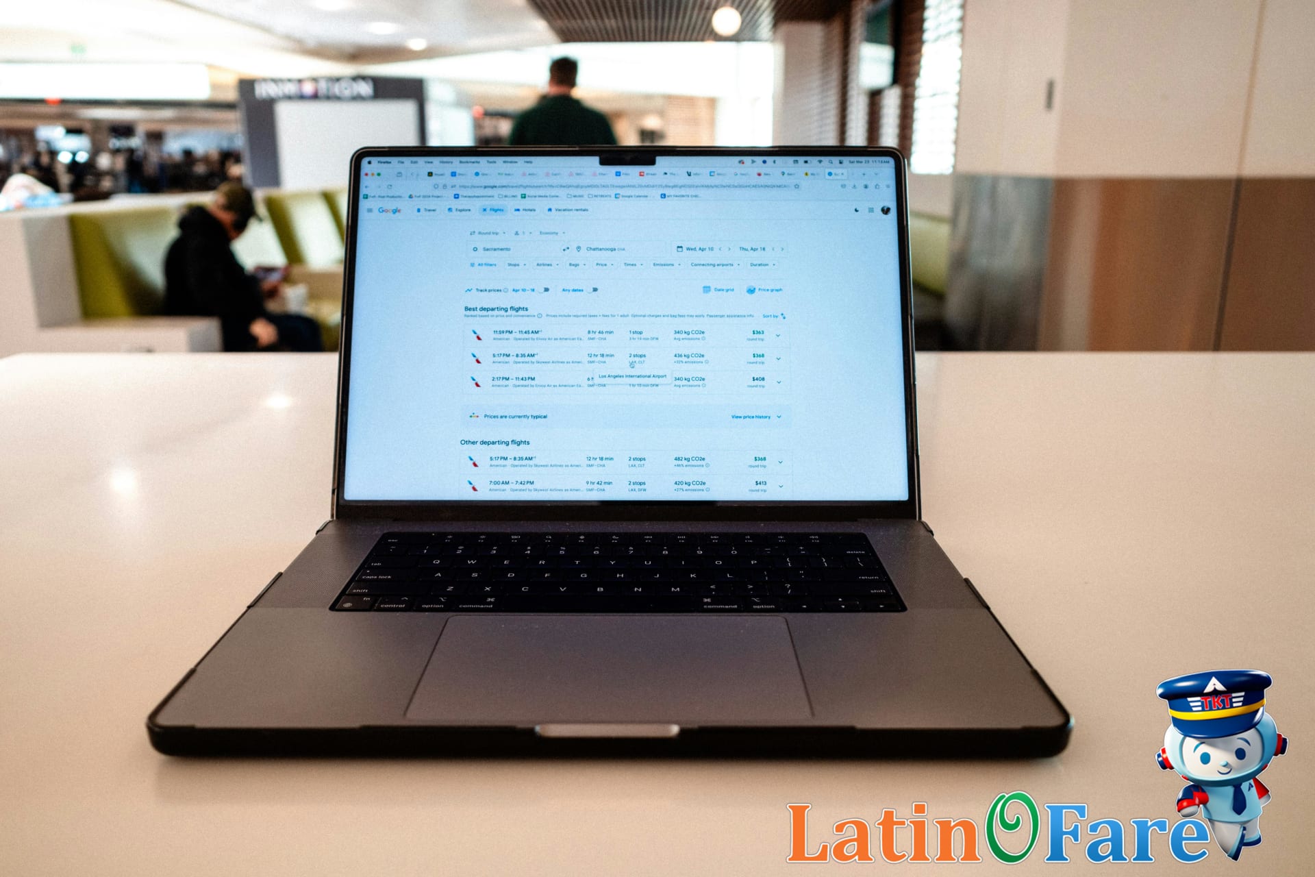 Traveler checking flight deals on laptop