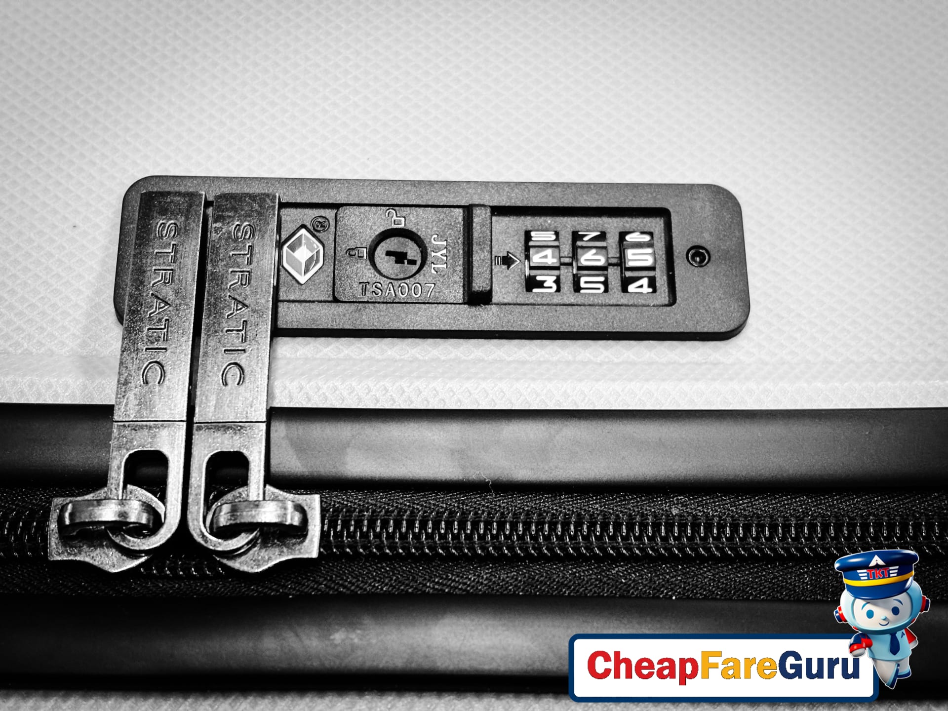 TSA agent inspecting portable charger at airport security