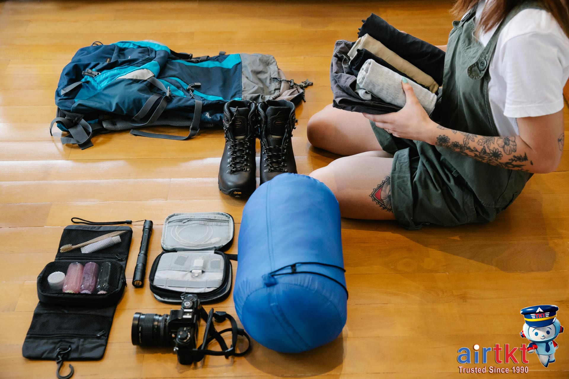 Essential hiking boot break-in items laid out