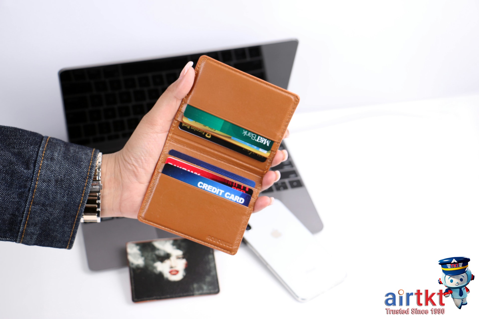 Traveler using RFID-blocking wallet