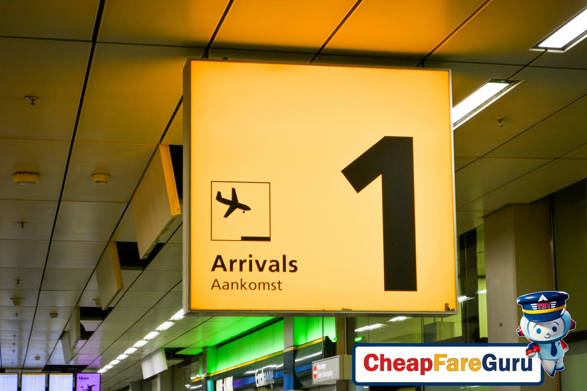 Travelers arriving at Dublin Airport terminal with signage