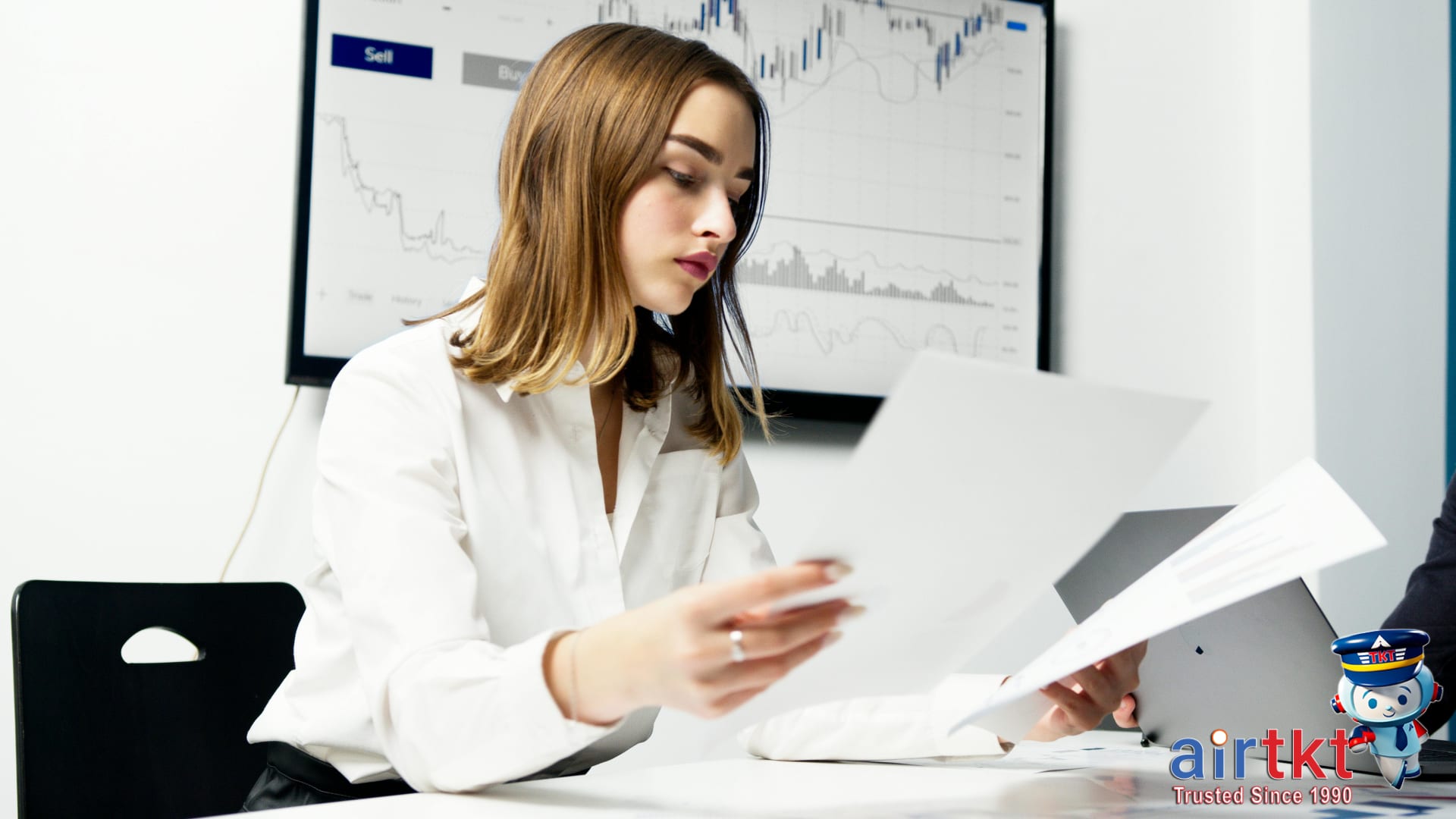 Airplane flying over city