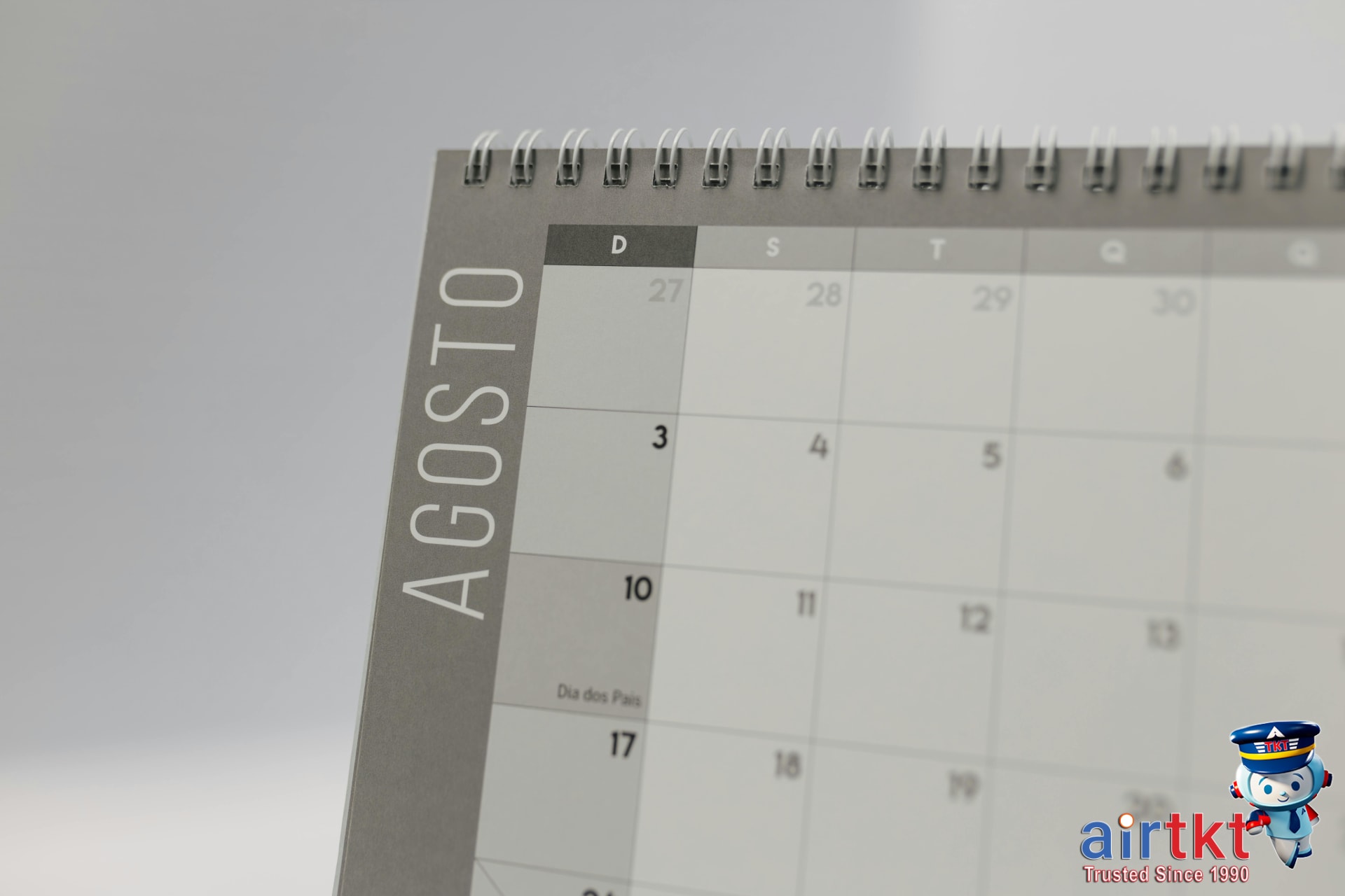 Spiral-bound calendar with travel dates
