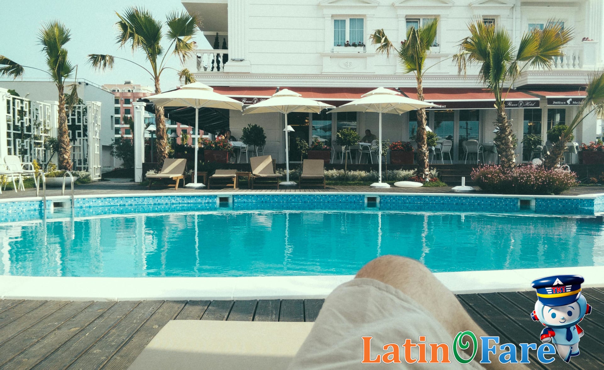 Business traveler working in hotel lobby