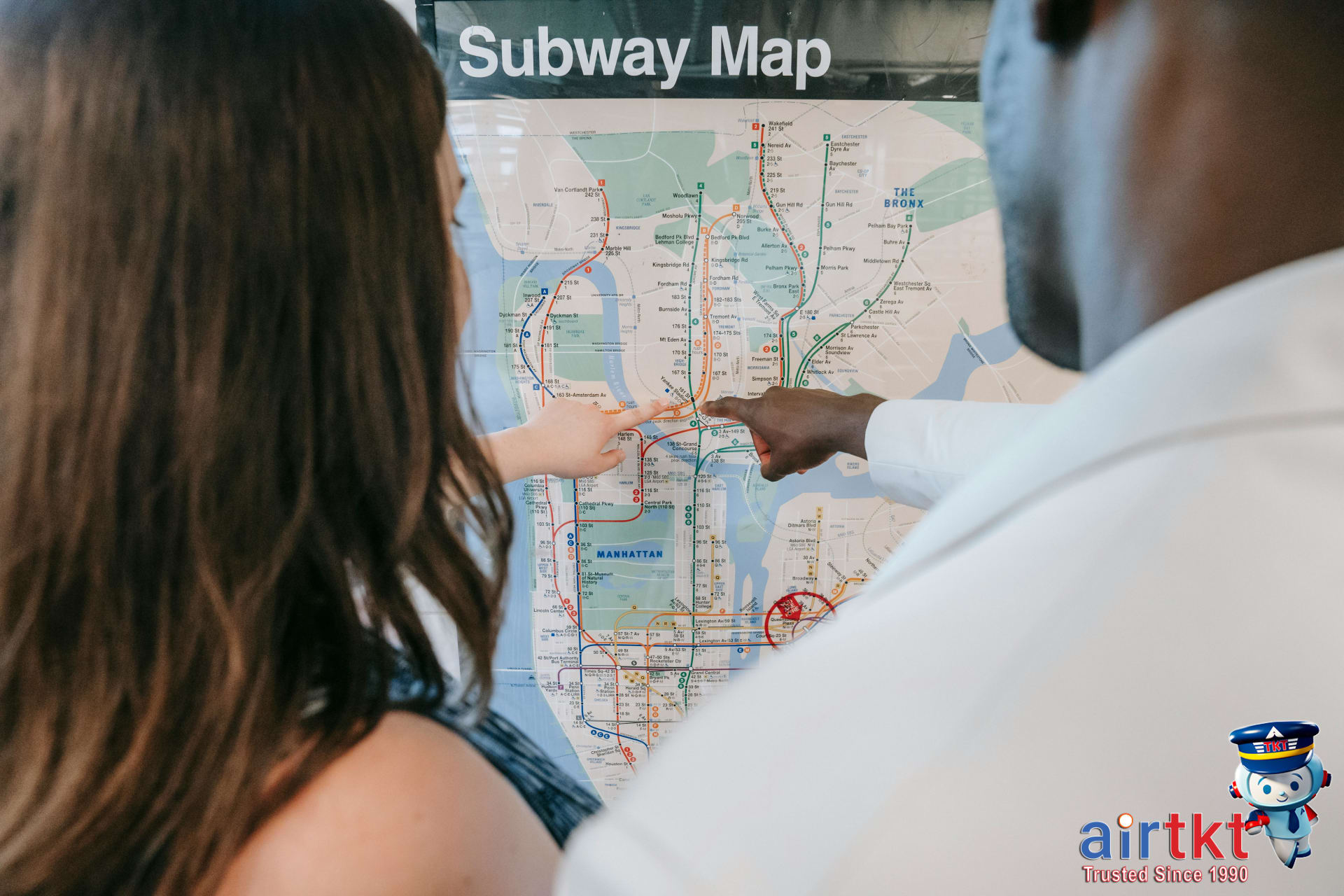 Couple planning transportation options in Manila