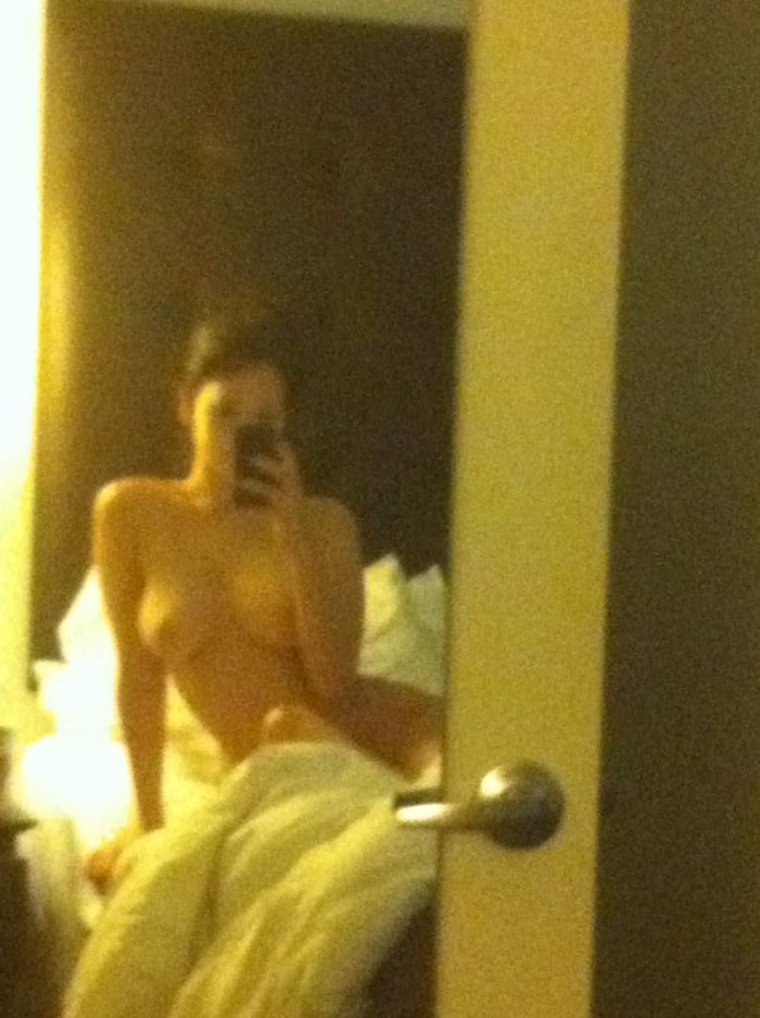star Jennifer Lawrence takes mirror selfie naked while sitting on her bed