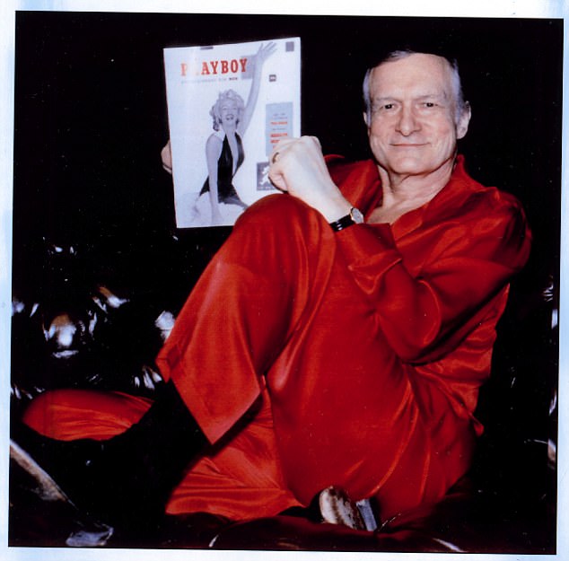 Gone but not forgotten: Hefner in his red pajamas with Marilyn Monroe on Playboy