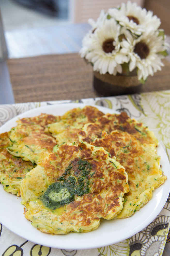 Cheddar zucchini pancakes with herb butter