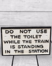 Cast Iron Antiqued Toilet Warning Sign