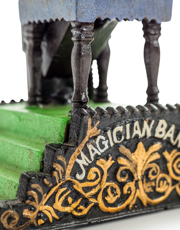 Cast Iron Magician Coin Bank 