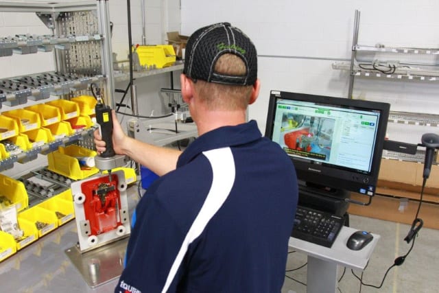 Shop floor operator following visual work instructions. As a screw is inserted the torque is recorded in a report in the VKS software and moves the work instruction to the next operation for the operator. (Image courtesy of Visual Knowledge Share.)