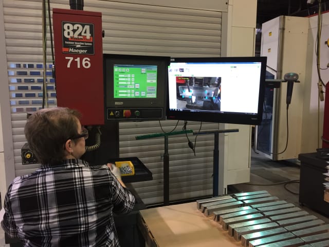 Shop floor operator following work instructions. The operator can only move to the next step once the pem is successfully inserted. (Image courtesy of Visual Knowledge Share.)