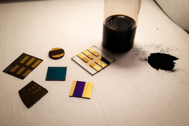A sample of pulverized coal with several test devices made by MIT researchers. (Image courtesy of MIT.)