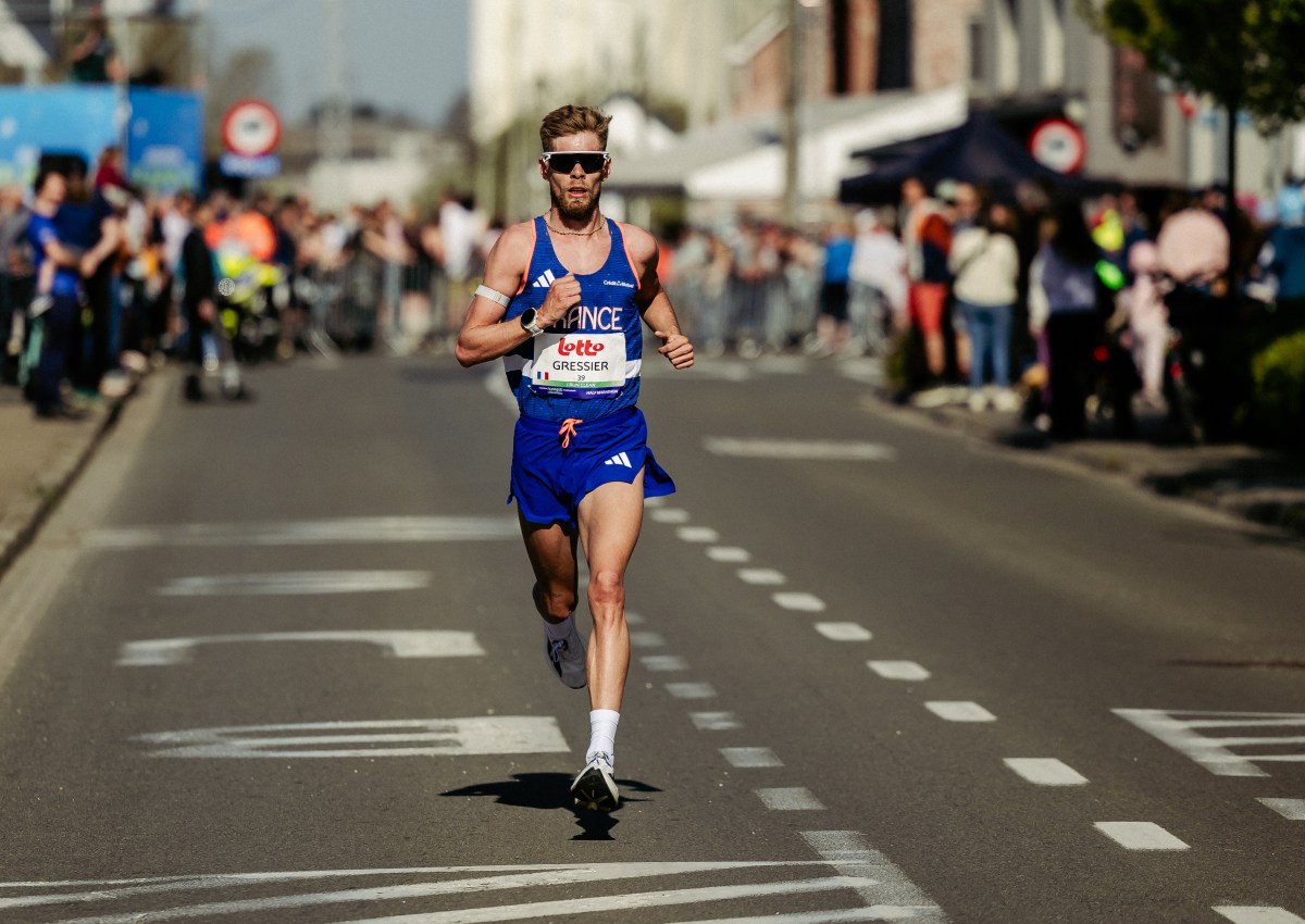 French runner Jimmy Gressier crosses finish line celebrating European 5km record in Lille