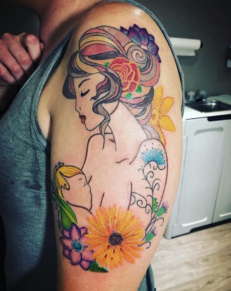 mother holding child tattoo