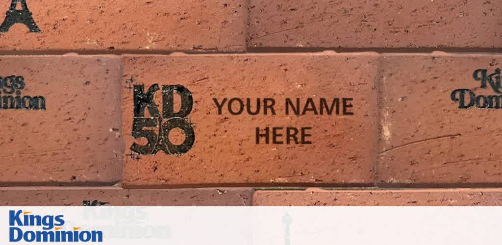 A wall of engraved bricks with 