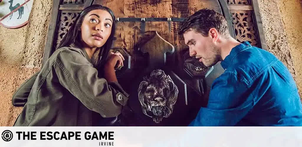 This image features a scene from The Escape Game Irvine, where a pair of players are engaged in an interactive puzzle-solving activity. On the left, a woman with long dark hair, wearing a green jacket, looks intently towards the viewer, possibly signaling a clue or a newfound discovery. On the right, a man in a blue shirt leans forward, concentrating on a piece of the game at hand, which looks to be a lion-headed knocker on a wooden surface, possibly a door, that adds to the ancient or mysterious aesthetic of the room they're in. They both appear to be in a dimly lit room that enhances the adventurous atmosphere of the escape game.

Experience the thrill of an escape room and work together to solve mysteries and puzzles. Remember, at FunEx.com, we are committed to providing you with the lowest prices and incredible savings on tickets for your next memorable adventure!