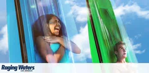 Image shows two individuals experiencing a water slide at Raging Waters Los Angeles. On the left, a woman, arms crossed, displays a thrilling scream as she descends a slide with a blue background. On the right, a person looks down with a sense of anticipation, behind a vibrant green slide. The water park's logo is visible at the bottom.