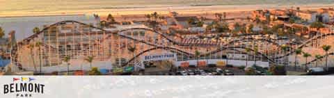 This image features a panoramic aerial view of Belmont Park, a historic oceanfront amusement park located in San Diego. The setting sun casts a warm glow over the landscape, highlighting the complex's iconic wooden roller coaster, which dominates the foreground with its series of dips and turns. Below the coaster, several other structures within the park are observable, though their details are less discernible. The backdrop shows a tranquil beach extending into the horizon, hinting at the park's scenic location by the Pacific Ocean. The park's logo, which reads "Belmont Park" in a bold, red font trimmed with white, is superimposed onto the lower portion of the photograph, suggesting a place rich with entertainment and seaside allure.

At FunEx.com, we pride ourselves on giving our customers the joy of new experiences while ensuring the thrill of savings with the lowest prices on tickets.