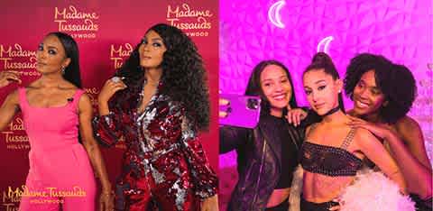 Four women pose together at Madame Tussauds Hollywood with pink backgrounds, smiling and showing off stylish outfits and hairstyles