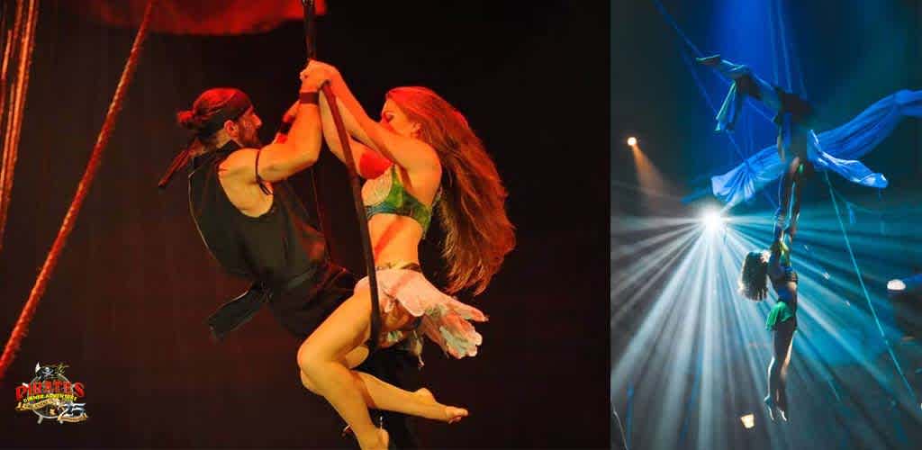 This image displays two separate aerial performances set against dark backgrounds, both illuminated by dramatic stage lighting. On the left, a male and female duo performs a partner acrobatic act on a vertical rope. The man, clad in black, provides support at the base as he clings to the rope, while the woman, dressed in a green and blue costume with a floral pattern, gracefully hangs from the rope utilizing her legs and leans outwards, supported by the man's strength. She has long, flowing red hair and wears white gloves, adding to the aesthetics of her dynamic pose. An audience-suggested logo for "Pirates Dinner Adventure" is visible in the corner.

On the right, a solo aerial artist demonstrates poise and flexibility in a striking blue silks act. The performer, also a woman, is dressed in a matching blue ensemble and is hanging upside-down from the silks which are gathered around one ankle, her body extended and arms outstretched. The mood is captivating as beams of white light fan out from the stage backlight, highlighting her silhouette.

For visitors seeking awe-inspiring performances like these with the bonus of savings, FunEx.com proudly offers the lowest prices and exclusive discounts on tickets to an array of events, ensuring an unforgettable experience without the extra cost.